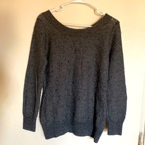 Dark gray woman’s sweatshirt.